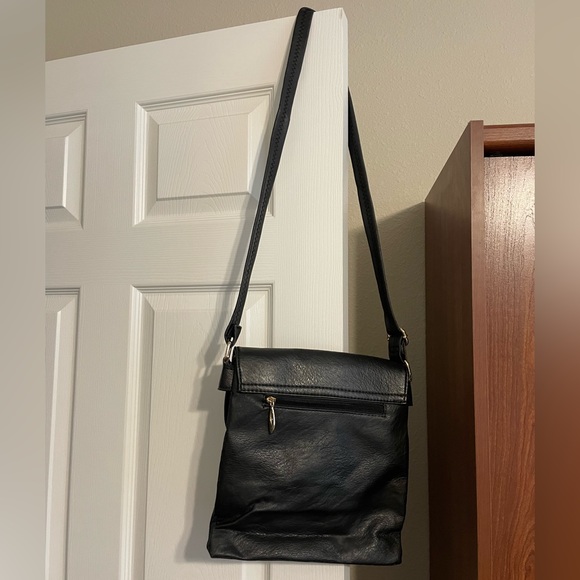 Black Crossbody Purse with Gold colored accents. - Picture 4 of 10